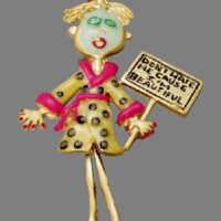 Don't hate me causer I am beautiful. Vintage brooch of Jewelry alloy of gold tone, enamel. 1980s. Tanya creations TC costume jewelry