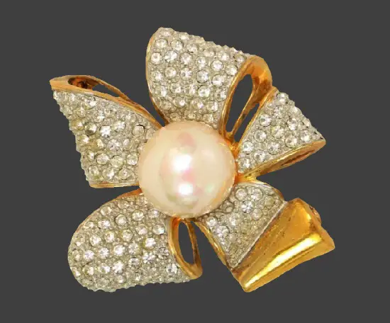 Bow brooch. Gold plated silver, rhinestones, faux pearl