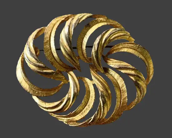 Gold tone swirl design brooch