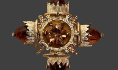 Maltese Cross pendant of gold tone, rhinestones, amber glass. 1960s. Signed Expan Vintage Costume Jewelry