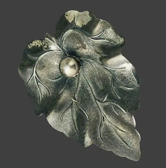 Textured sterling silver leaf with the veins and center raised dot sterling silver brooch