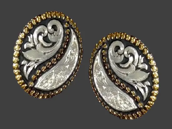 Ornate silver gold and black round earrings