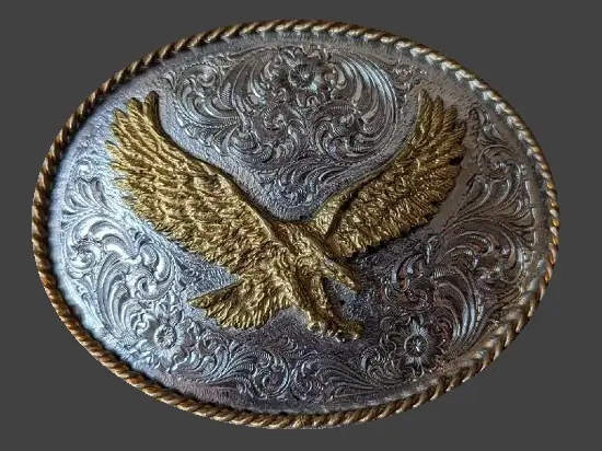 Stunning silver and gold plated oval eagle design belt buckle. 1980s. Montana Silversmiths Vintage Western Jewelry